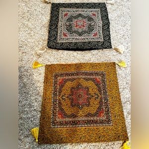 Patterned tasseled pillow covers with zip sides; 17x17.5; one black, one gold